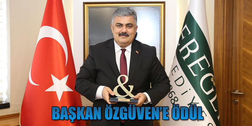 BAŞKAN ÖZGÜVEN’E ÖDÜL.