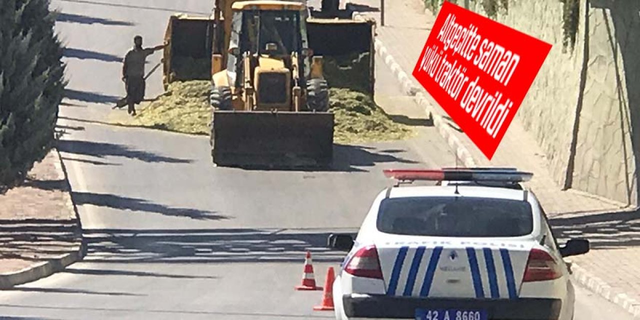 Alt geçitte saman yükü traktör'ün römorku devrildi