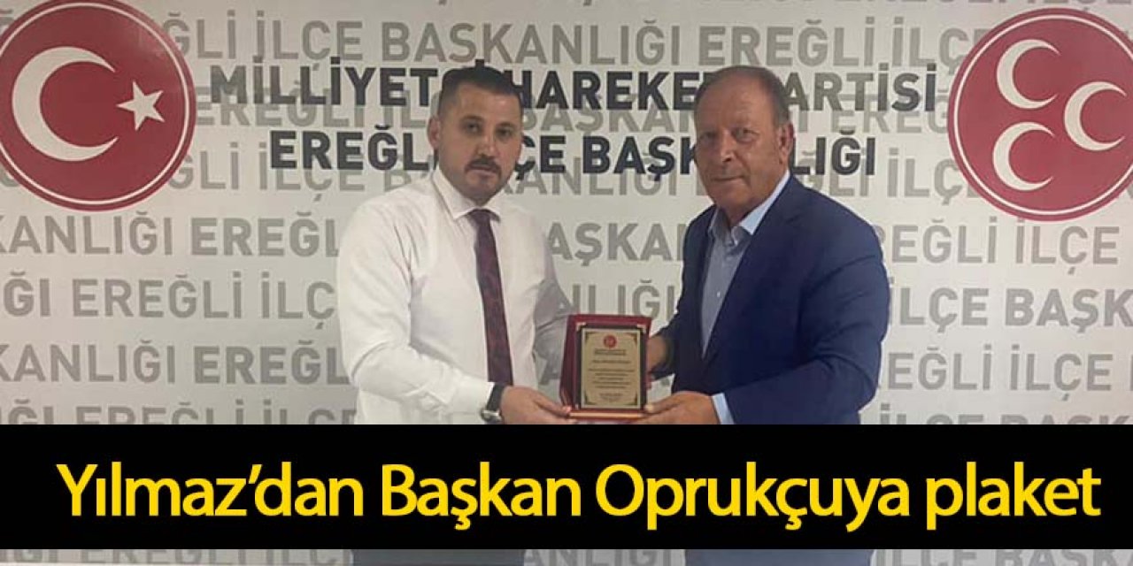 Yılmaz’dan Başkan Oprukçuya plaket