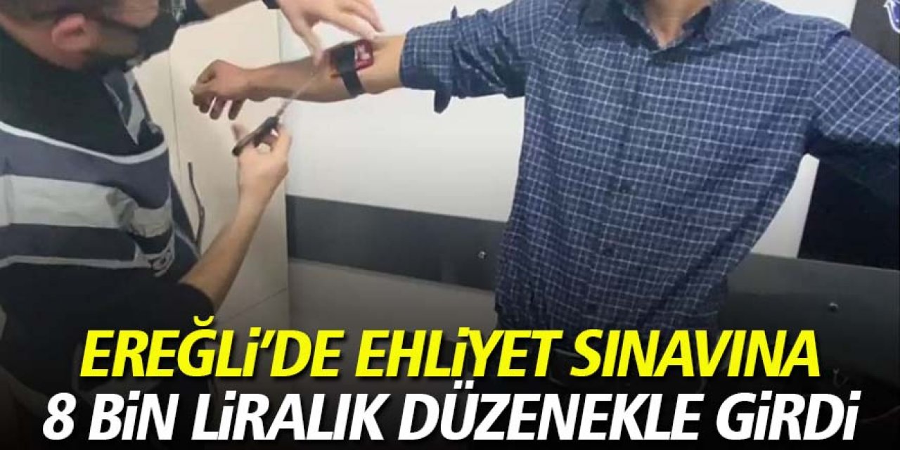 Ehliyet sınavına, gömleğinin kol düğmesindeki gizli kamera düzeneğiyle girdi